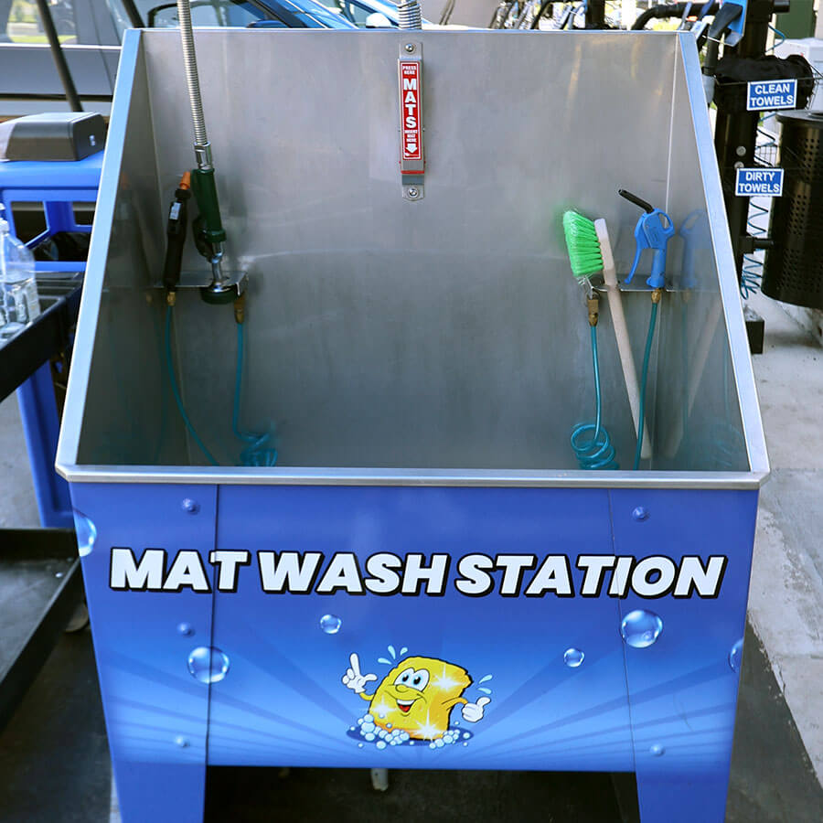 Car wash mat washing station
