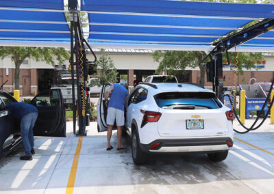 Car wash customer using vacuum