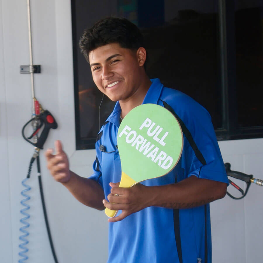 Smiling car wash employee Smiling car wash employee